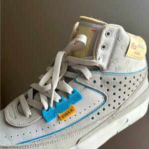 Nike Gray and Blue Sneakers with Perforated Design